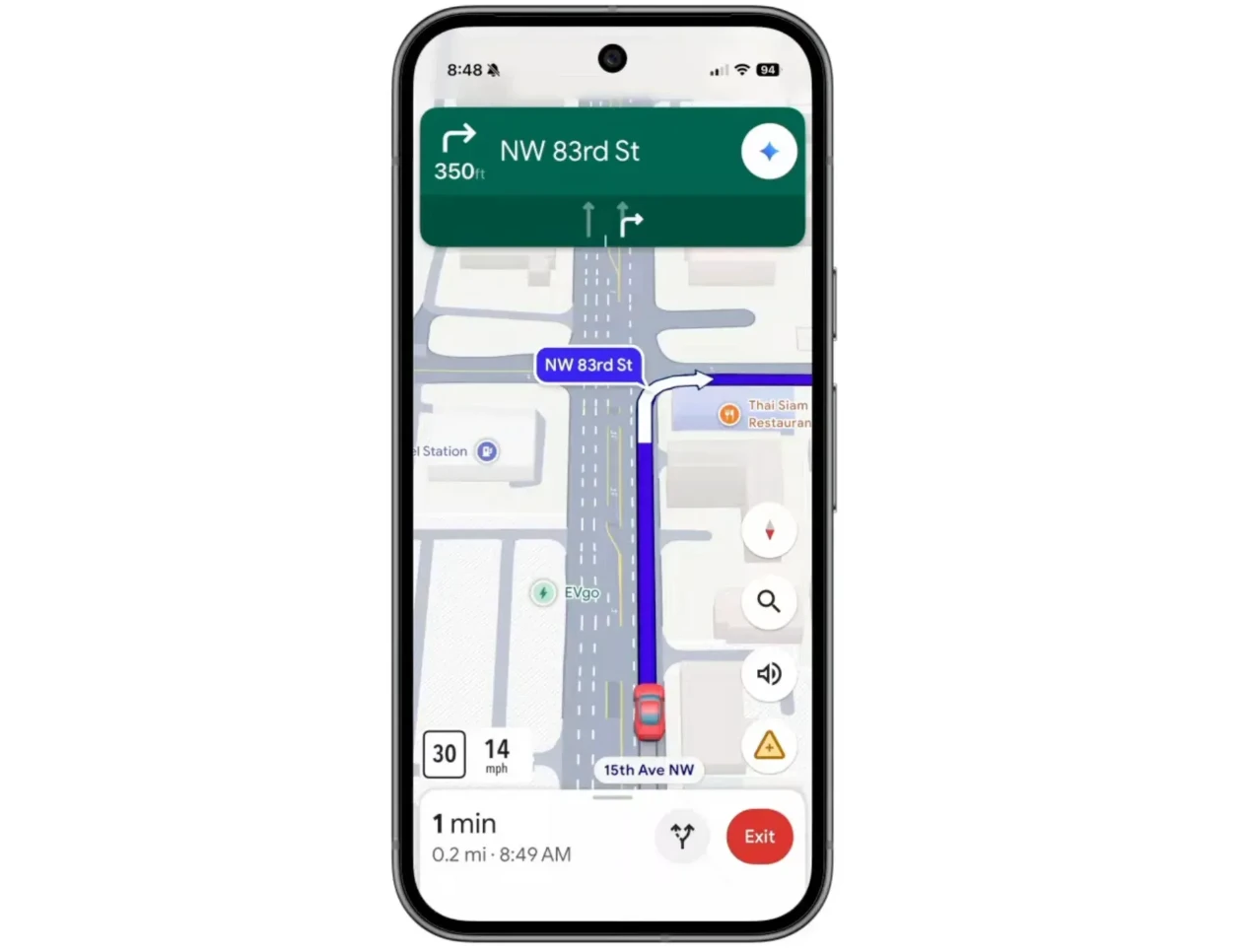Google Maps navigation screen with Gemini guiding a driver through a turn, the corner restaurant highlighted